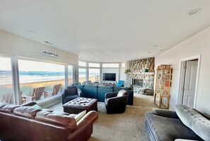 Double living room with windows all facing the beach, so much light!