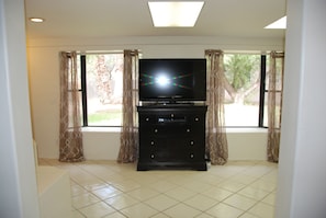 View of Master Work out room with High Def TV