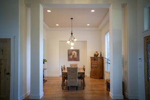 Dining Room with Wood Floors and high ceilings