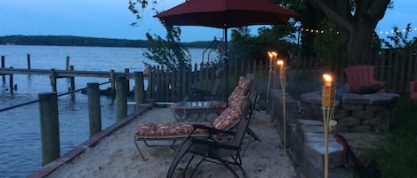 Your own private beach and fire pit for a relaxing night