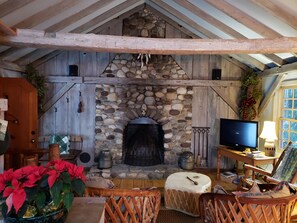 Upstairs Living room and custom stone  wood burning  fireplace