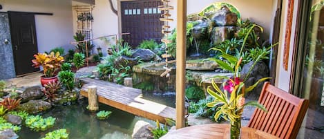 Oasis is a unique tropical escape, built around a waterfall garden courtyard