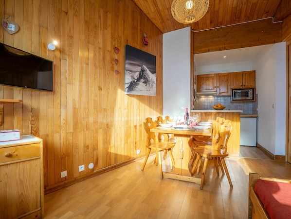 Furniture, Table, Wood, Cabinetry, Lighting, Architecture, Interior Design, Flooring, Wood Stain, Chair