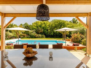 Water, Plant, Property, Furniture, Building, Shade, Lighting, Outdoor Furniture, Chair, Interior Design