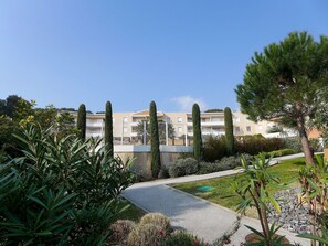 Sky, Plant, Building, Land Lot, Grass, Urban Design, Landscape, Tree, House, Shrub