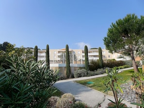 Sky, Plant, Building, Land Lot, Grass, Urban Design, Landscape, Tree, House, Shrub