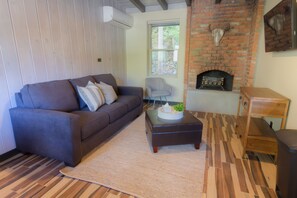 living room with queen sofa bed