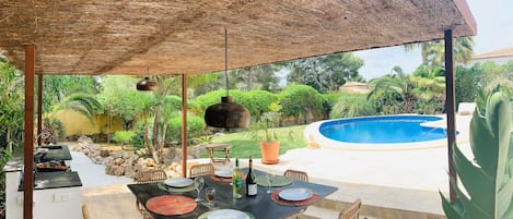 Outdoor Ibiza style area with BBQ and Plancha 
