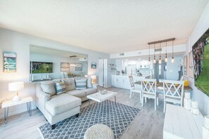 Relax on the cozy sofa, watch the game, or gather for meals