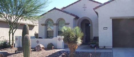 Front of home with patio