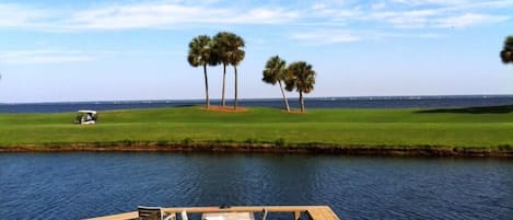 view from upper deck of golf course and the bay