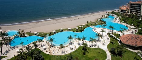 View of Ocean, Gardens,  and Infinity Swimming Pool from our balcony