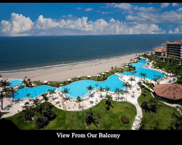 View of Ocean, Gardens,  and Infinity Swimming Pool from our balcony