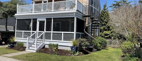 Main House with spiral staircase up to the second floor deck