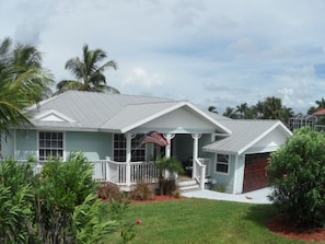 Charming Key West Style 3/2 Home, waterfront with pool and screen enclosure