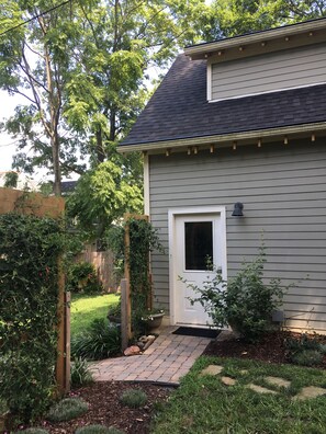 Private entrance with self-entry keypad.