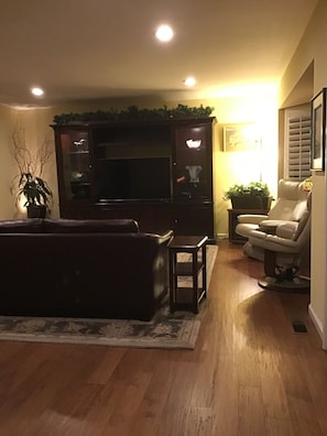 Family room with large smart TV.