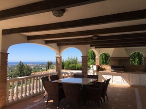 Al-fresco terrace with barbecue and dining area