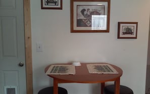 Another picture of small table in kitchen.
