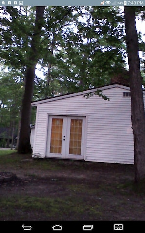 Back of house with firepit