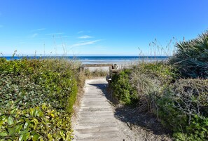 Path to the white sandy beach.