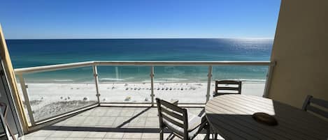 Your balcony 4 chairs and a table overlooking the gulf of Mexico!