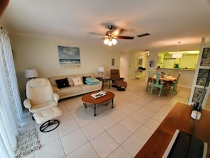 Living room looking towards dining area and kitchen