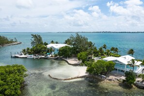 View of Middle Cay facing the beach! You see the main house and the cottage