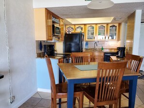 Pub height table and chairs for dining