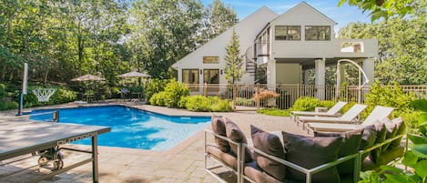 Exterior - complete with pool, loungers, basketball hoop and ping pong table