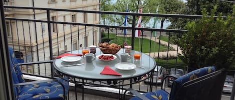 Breakfast on the balcony overlooking Lake Geneva