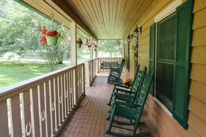 Front porch with 4 rocking chairs and a great view 