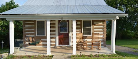 Front porch with rockers and porch swing.