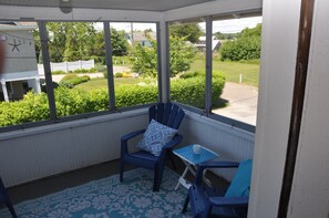 Upstairs veranda with neighborhood view.