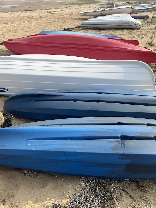 Two blue single kayaks are available for guests - at Lobsterville Pond