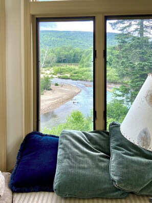 Captivating view of the Ammonoosuc River from the comfort of the living room.