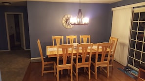 Hickory table and chairs for 8 or can be converted for 6.