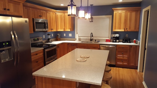 Newly renovated kitchen with new appliances. New serving ware etc.