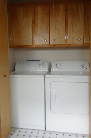 Full size washer and Dryer for guest use, conveniently located in bathroom 