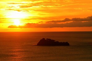View from rental,Sunset on the ocean every night.