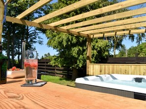 Outdoor bar with seating area.