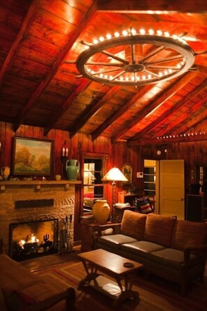 Cozy fireplace & living room at night