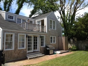 Back of house. Private 2nd floor deck, huge 65' gas grill, big outdoor shower