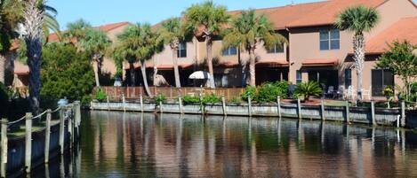 View of the townhome from the waterway. 