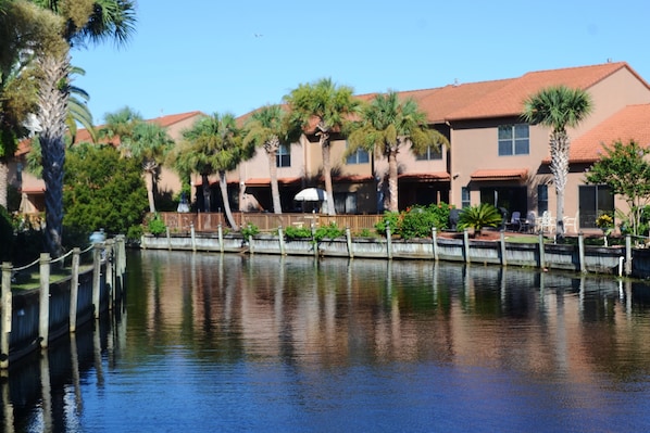 View of the townhome from the waterway. 