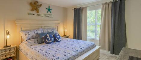 Newly renovated bedroom with king size bed and 32" Smart TV