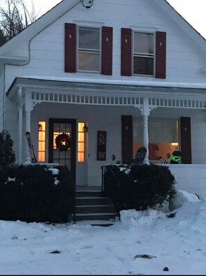 Front porch for visiting with family and friends. Perfectly situated in town.