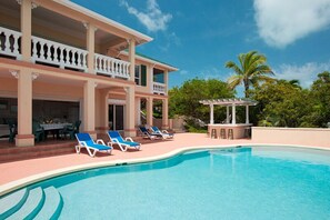 Main house pool, & wet bar.