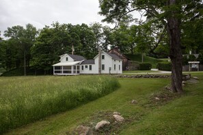 Back view: cottage is across the street from the Ashintully Gardens.