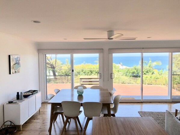 Dining area opening onto new large deck